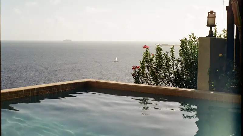 Infinity pool on a hotel terrace overlooking the sea